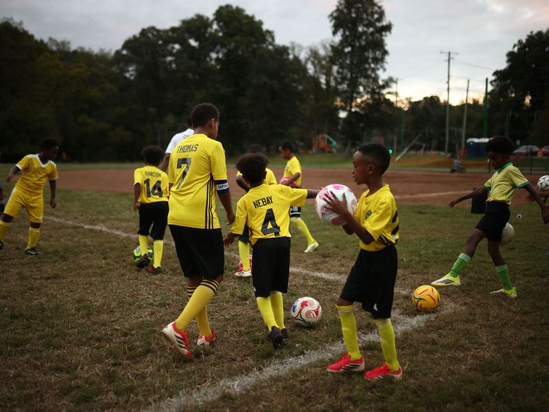 Players competing for the ball during a small sided game